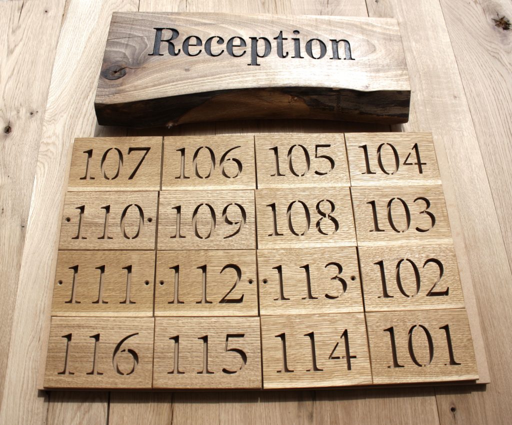 boutique villas oak room numbers and reception sign